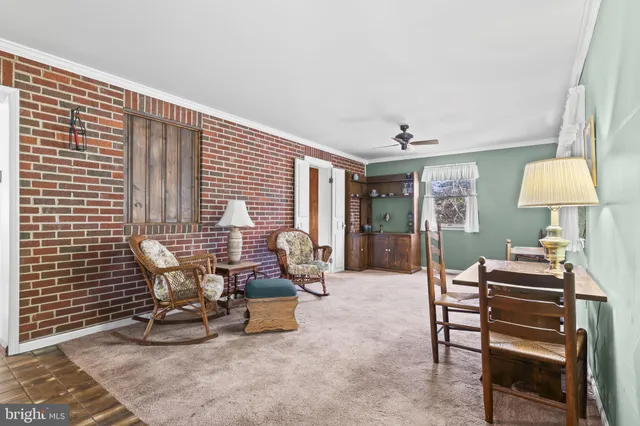 a workspace with furniture and window