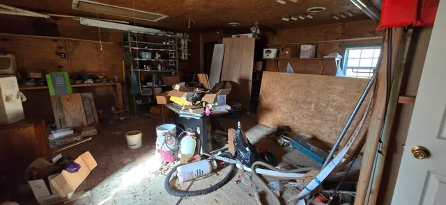 walk in closet with wooden floor