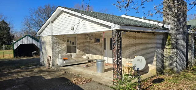 a front view of a house with parking