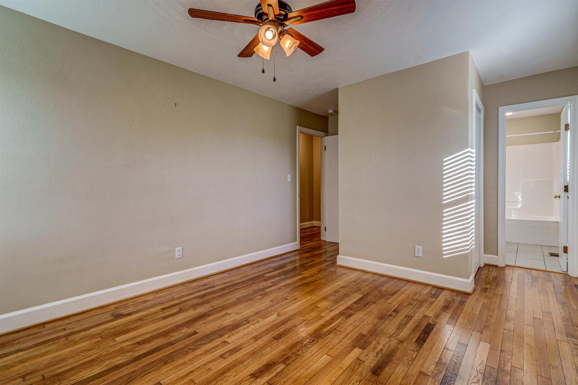 398 Jamestown Road Rocky Mount, VA 24151 - Photo 20 of 42 wooden floor in an empty room with a window