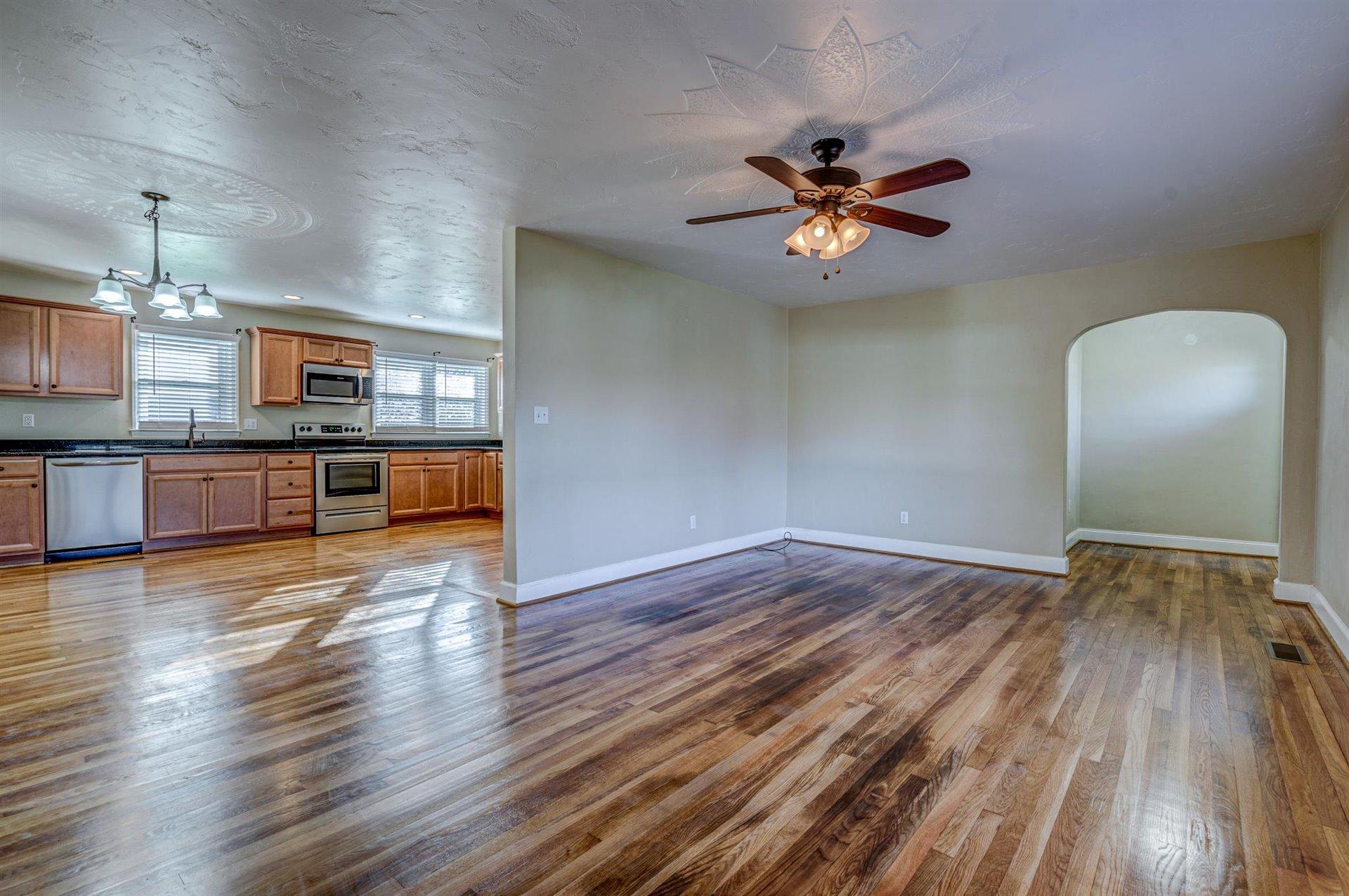 398 Jamestown Road Rocky Mount, VA 24151 - Photo 5 of 42 a view of a house with wooden floor and a kitchen