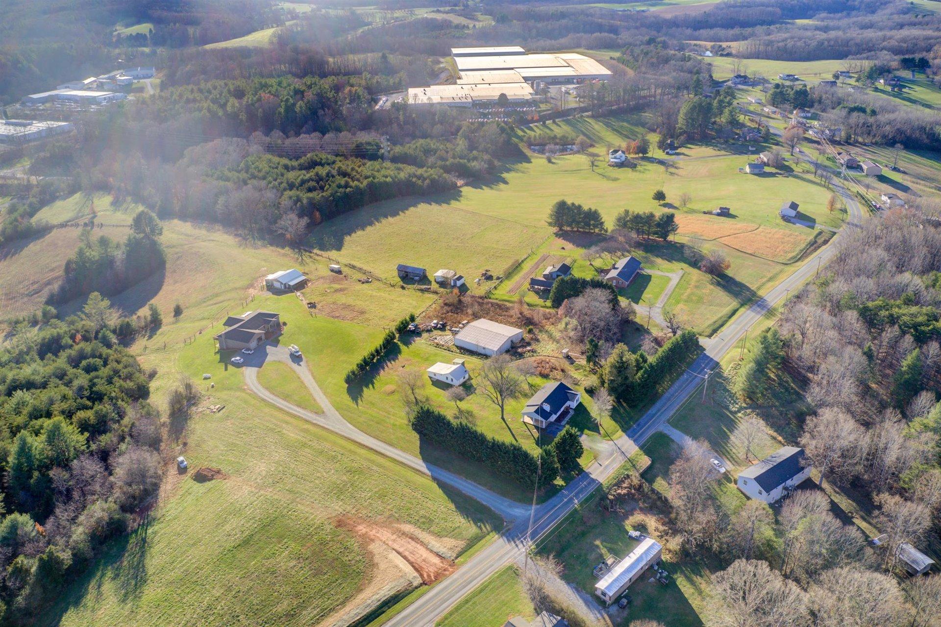 398 Jamestown Road Rocky Mount, VA 24151 - Photo 42 of 42 an aerial view of a house with a swimming pool