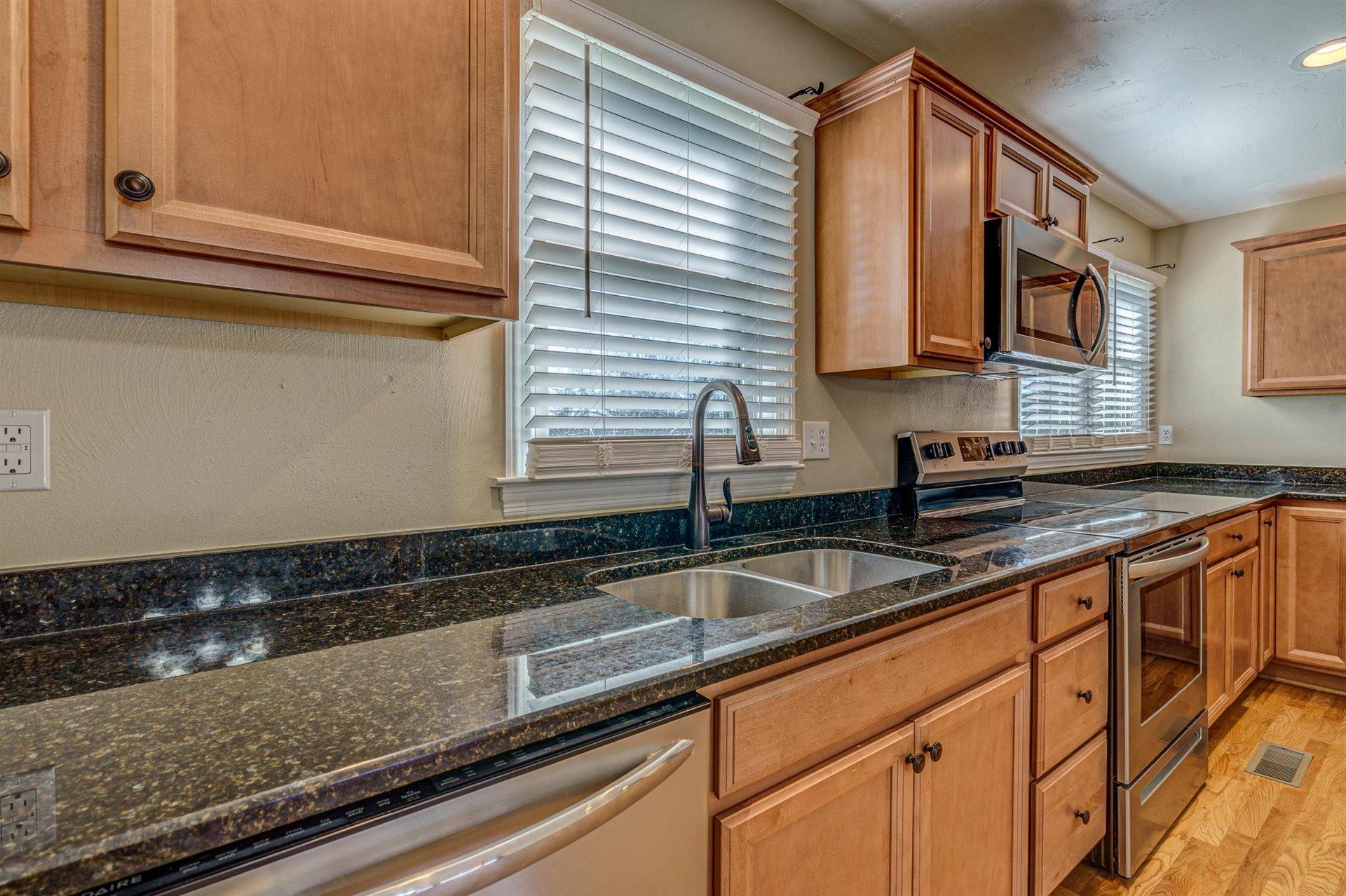 398 Jamestown Road Rocky Mount, VA 24151 - Photo 6 of 42 a kitchen with sink and cabinets