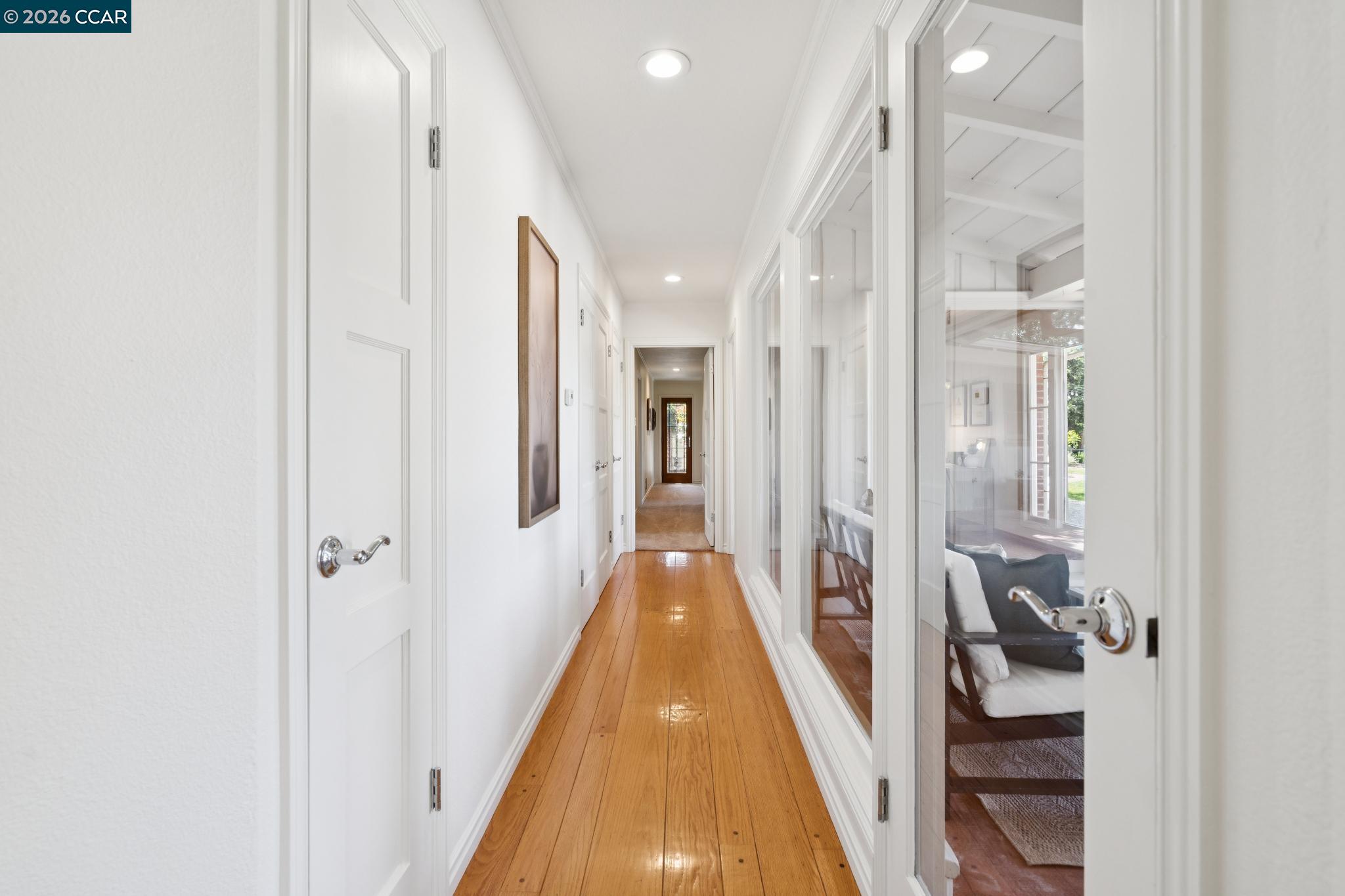 20 Santa Rita Drive Walnut Creek, CA 94596 - Photo 11 of 44 a view of a hallway with wooden floor and staircase