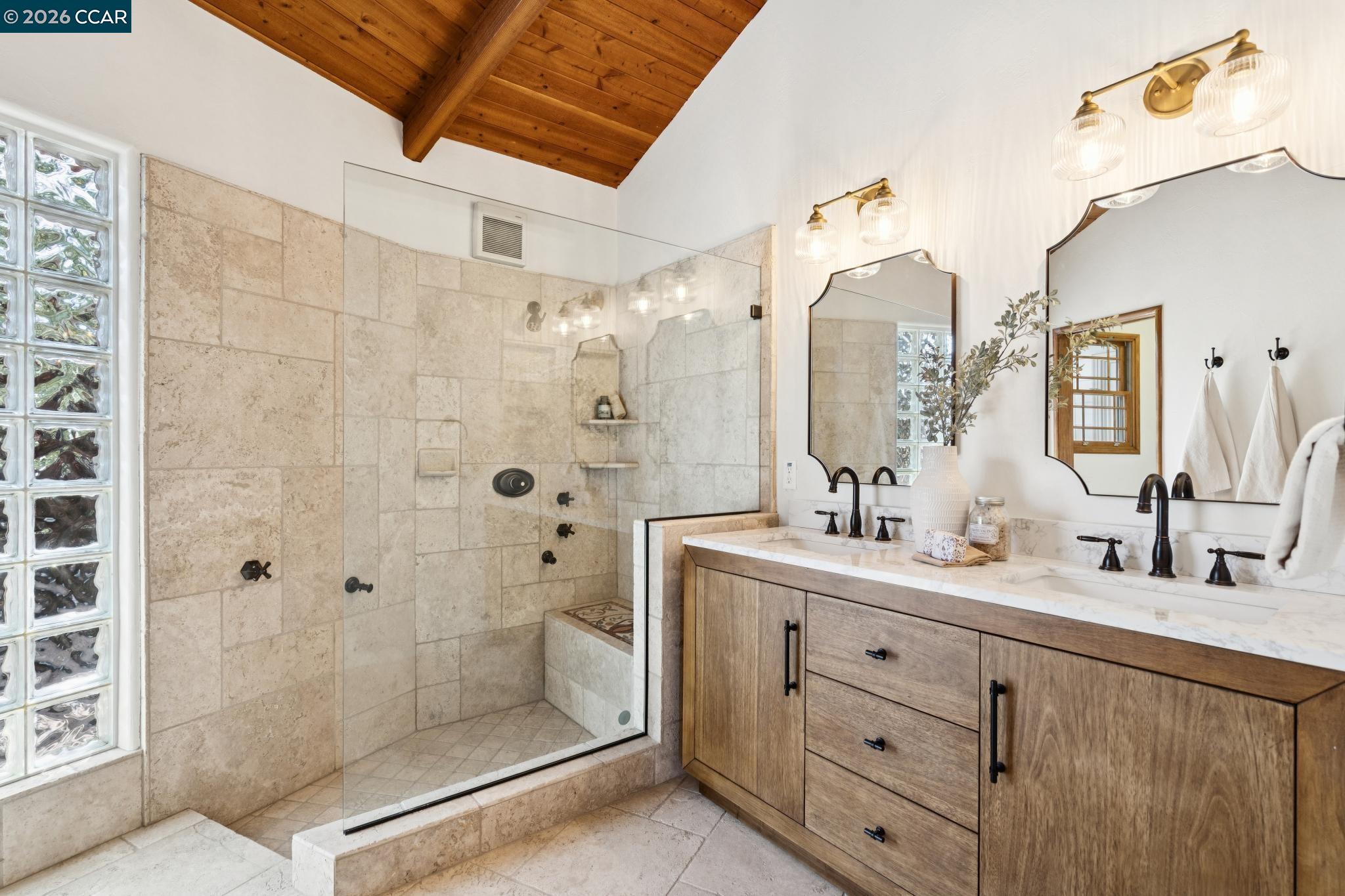 20 Santa Rita Drive Walnut Creek, CA 94596 - Photo 17 of 44 a bathroom with a double vanity sink mirror and shower