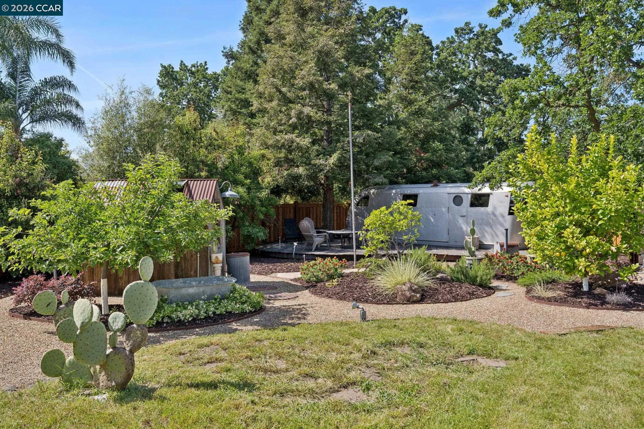 20 Santa Rita Drive Walnut Creek, CA 94596 - Photo 33 of 44 a backyard of a house with yard and outdoor seating