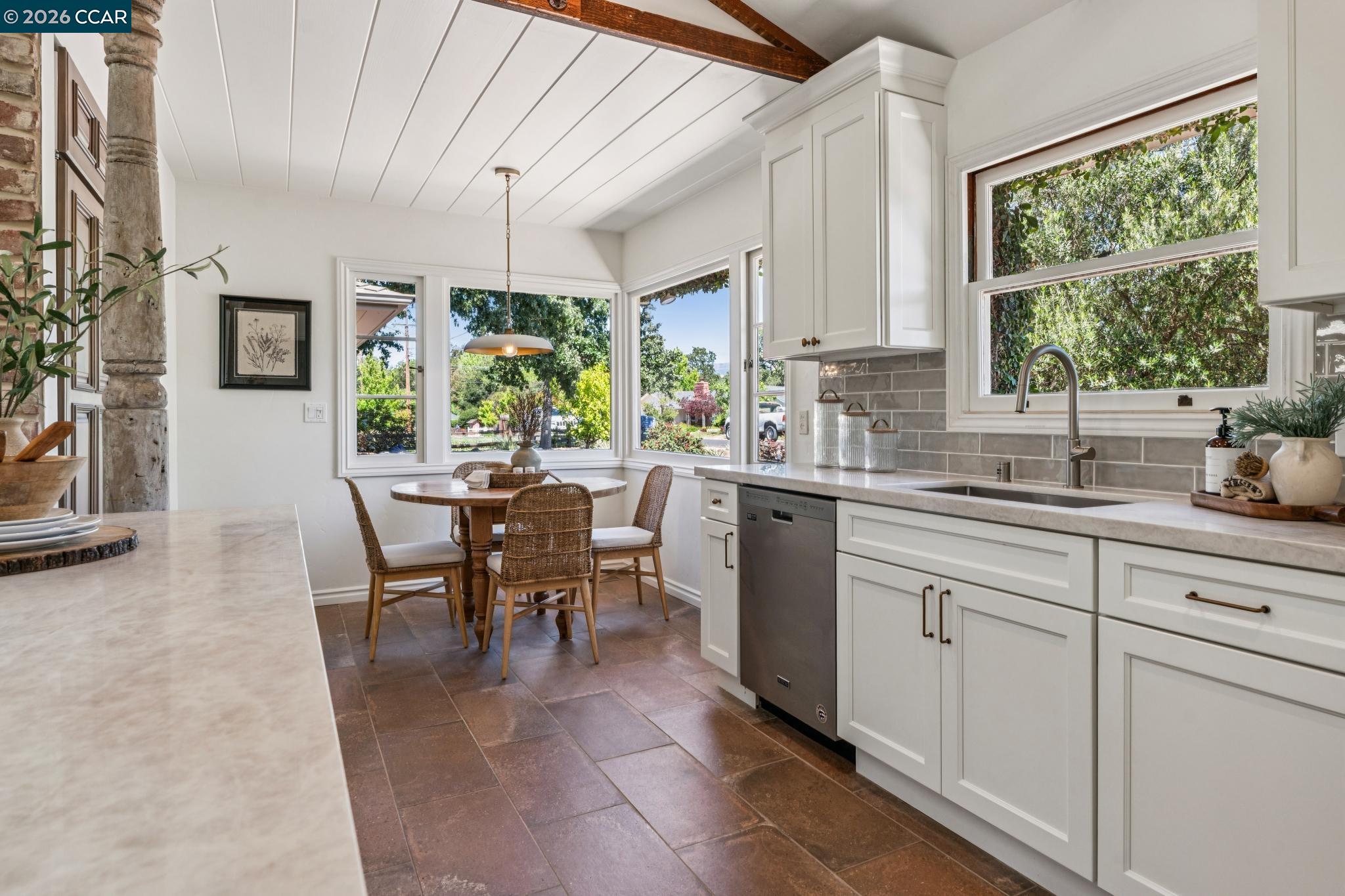20 Santa Rita Drive Walnut Creek, CA 94596 - Photo 5 of 44 a view of a dining table chairs and chandelier in the room