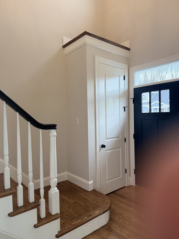18 Powder House Lane, Unit 5 Walpole, MA 02032 - Photo 7 of 20 a view of entryway with wooden floor