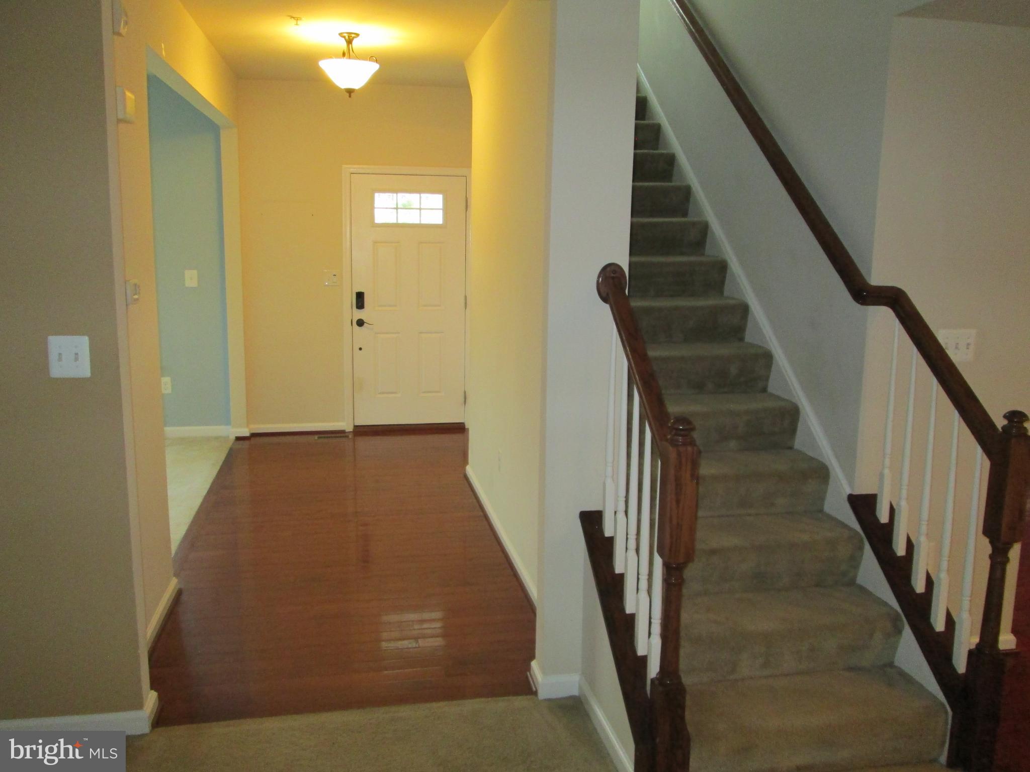 900 Gladway Road Baltimore, MD 21220 - Photo 28 of 68 Entry Foyer toward Door & Stairs to Upper Level