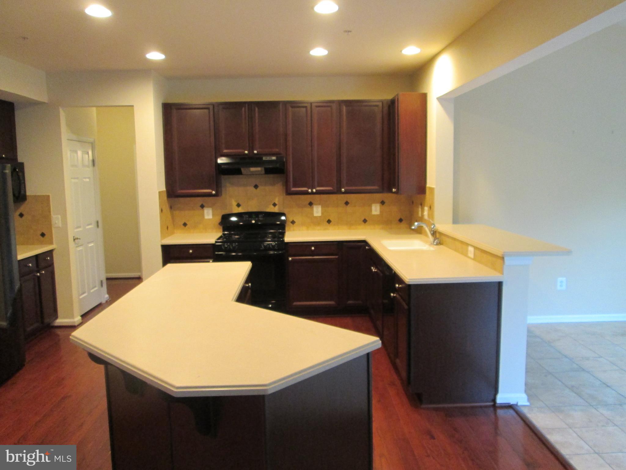 900 Gladway Road Baltimore, MD 21220 - Photo 7 of 68 Gourmet Kitchen w/Hardwood floor view 1
