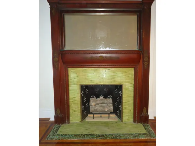 a fireplace with a clock on top