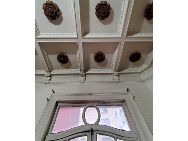 a view of staircase with a rug
