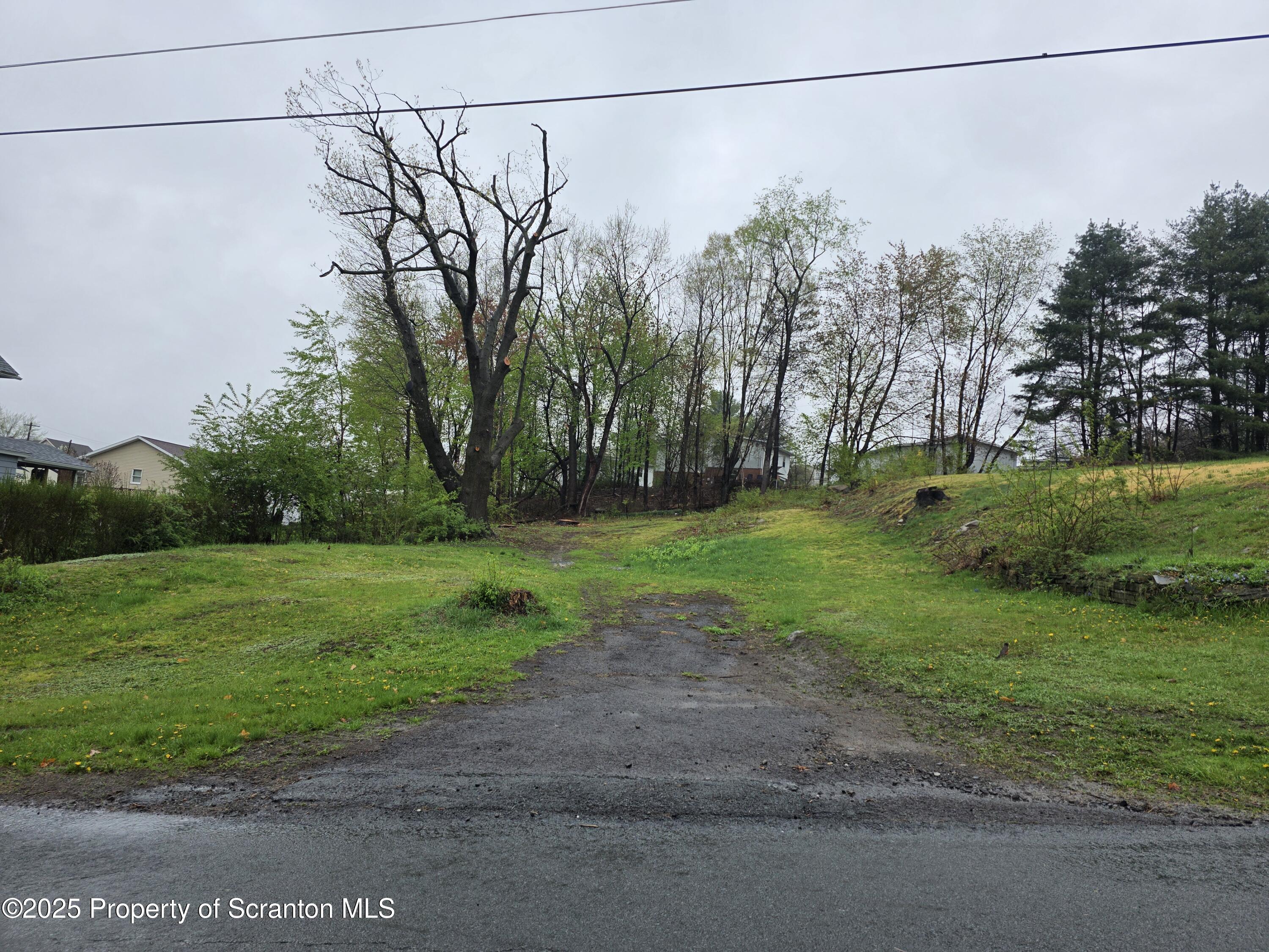 1108 Filbert Street Archbald, PA 18403 - Photo 2 of 2 a backyard of a house with lots of green space