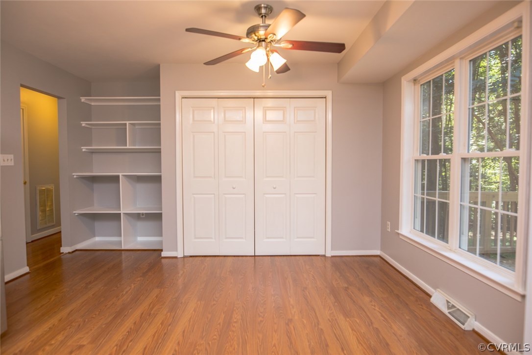 564 Jackson Road Bumpass, VA 23024 - Photo 12 of 36 wooden floor in an empty room with a window