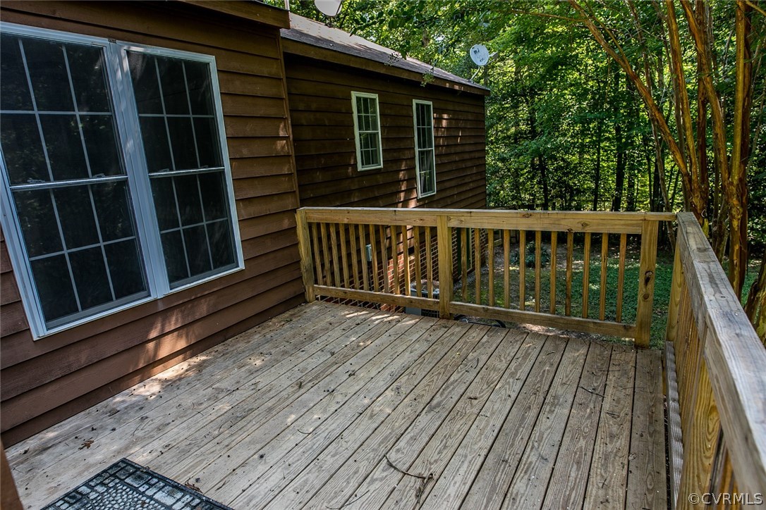 564 Jackson Road Bumpass, VA 23024 - Photo 31 of 36 a view of deck with wooden floor and fence