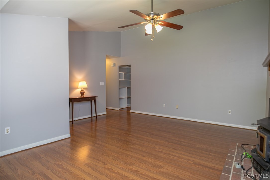564 Jackson Road Bumpass, VA 23024 - Photo 4 of 36 wooden floor in an empty room with a window