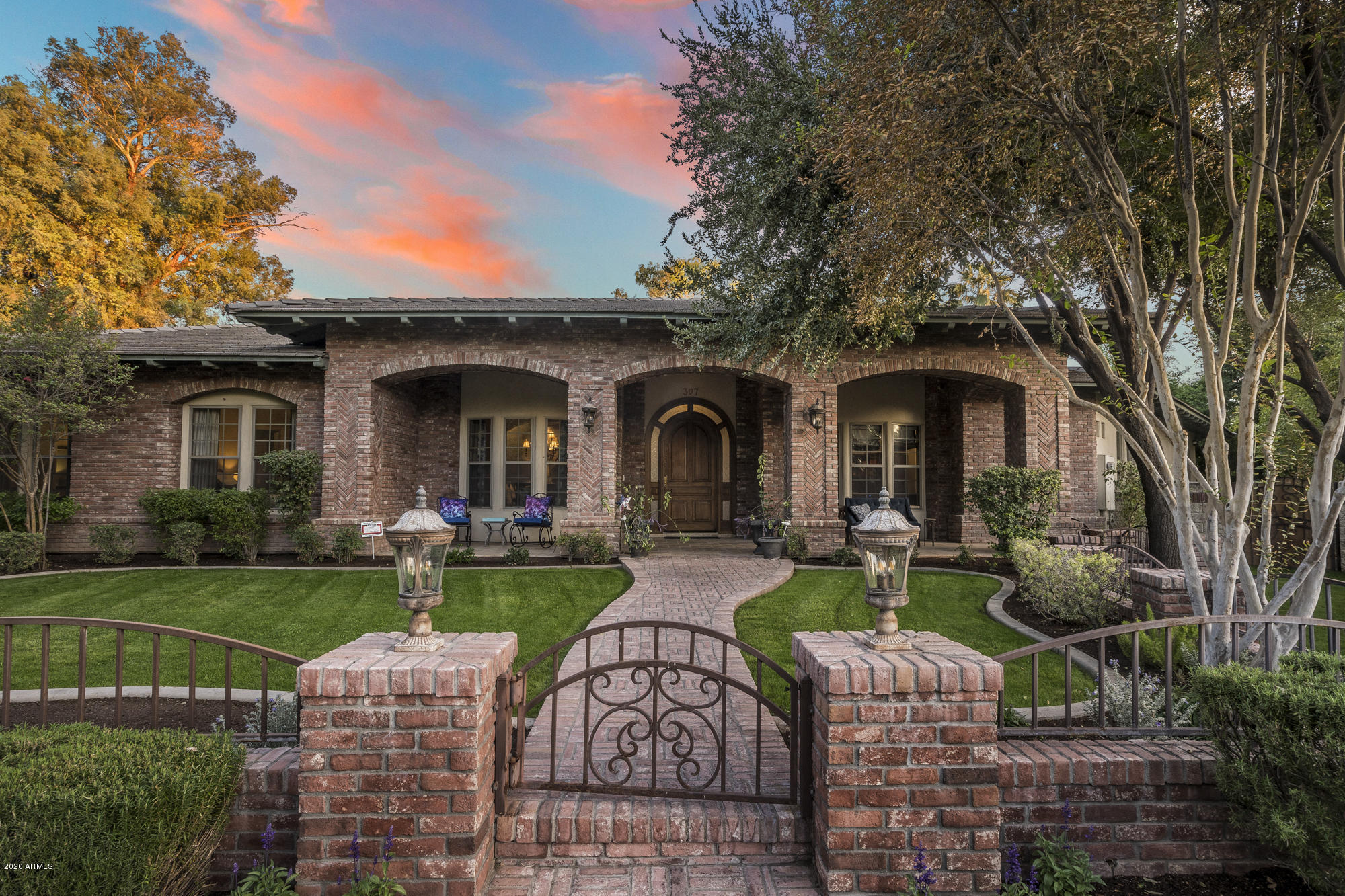 307 West Lamar Road Phoenix, AZ 85013 - Photo 2 of 61 a front view of a house with garden and porch