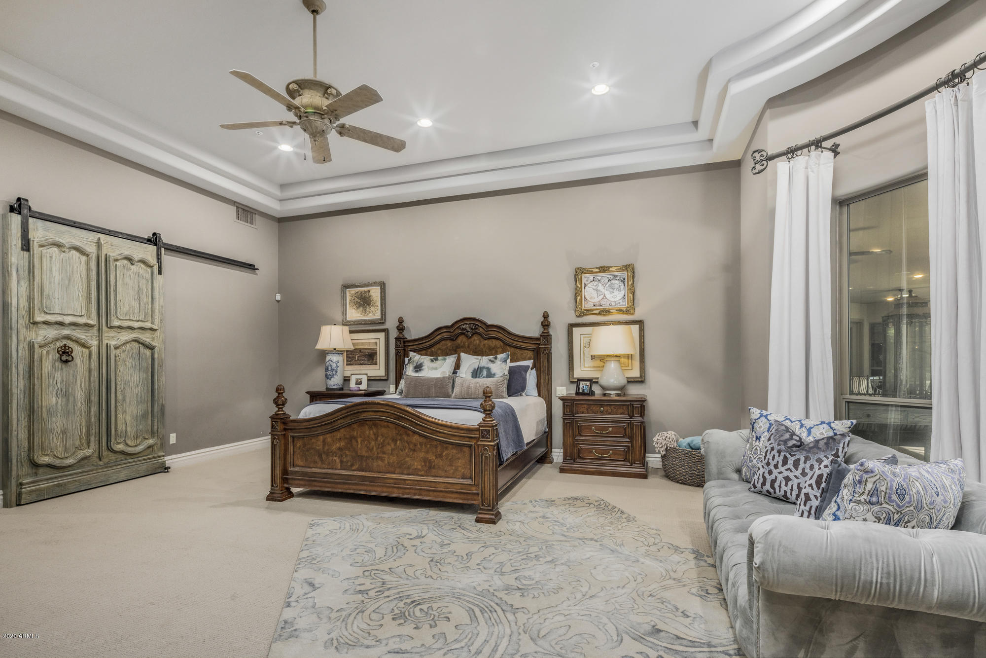 307 West Lamar Road Phoenix, AZ 85013 - Photo 23 of 61 a spacious bedroom with a bed and ceiling fan