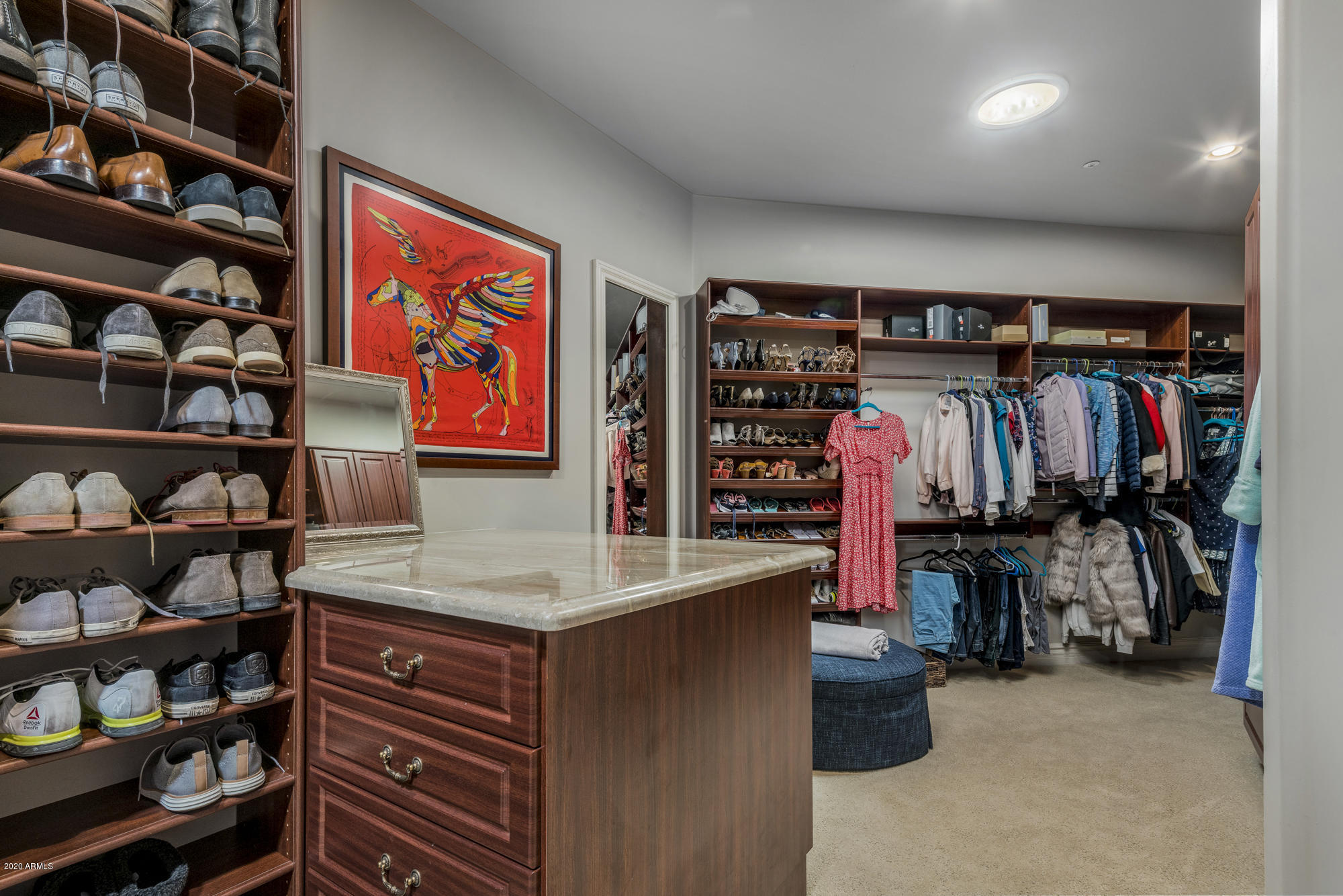 307 West Lamar Road Phoenix, AZ 85013 - Photo 29 of 61 a view of walk in closet with clothes and shoes