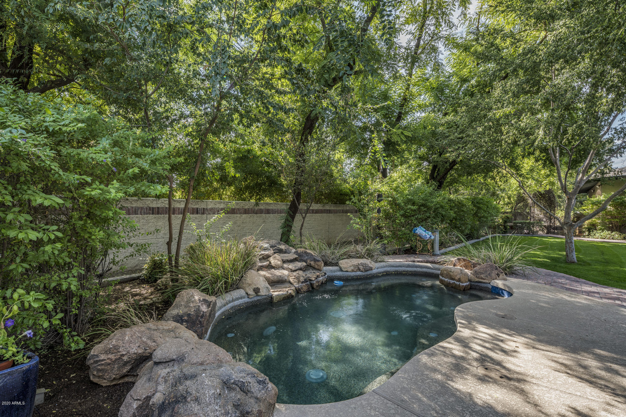 307 West Lamar Road Phoenix, AZ 85013 - Photo 43 of 61 a view of swimming pool with a yard and outdoor seating