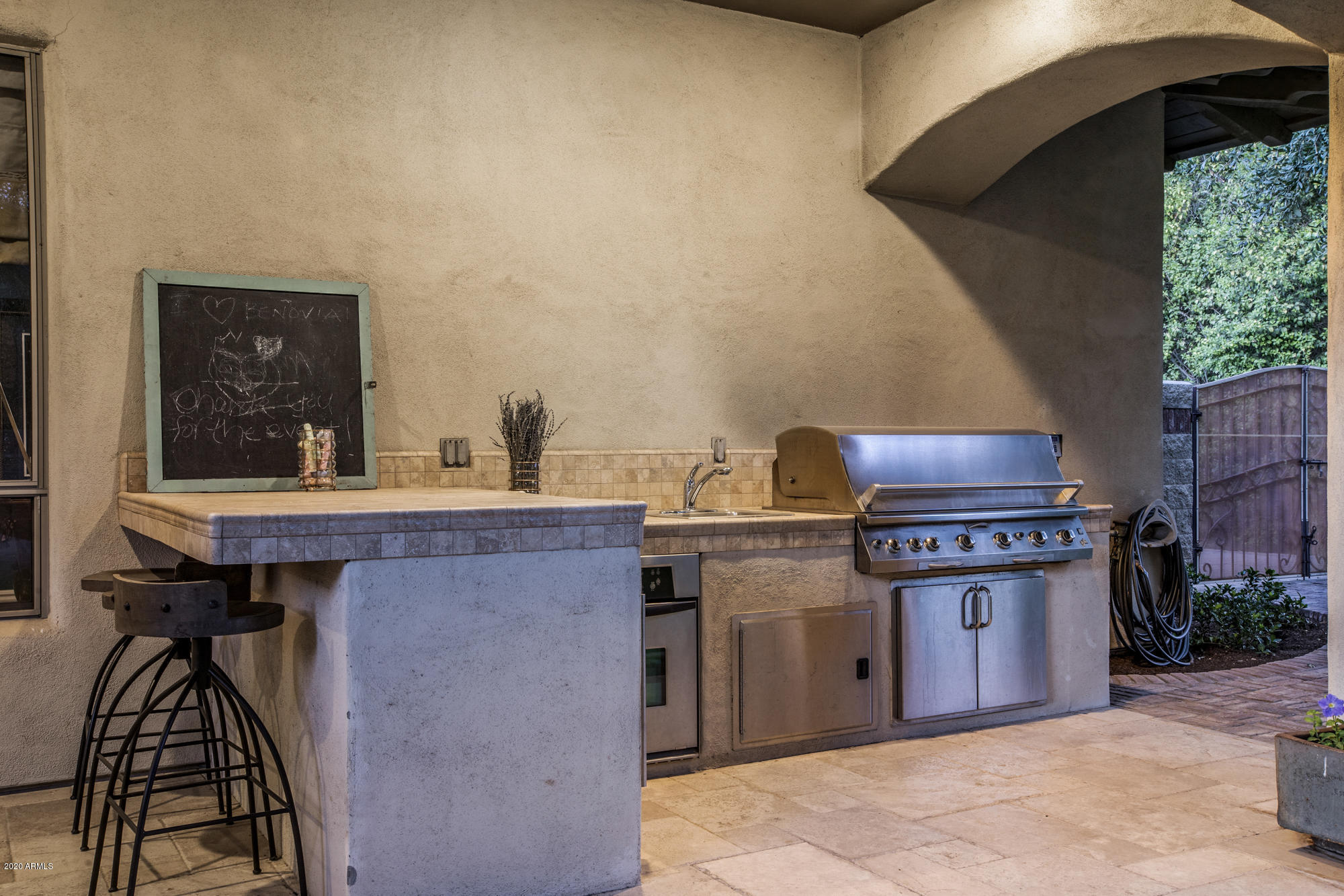 307 West Lamar Road Phoenix, AZ 85013 - Photo 51 of 61 a kitchen with stainless steel appliances granite countertop a stove and a sink