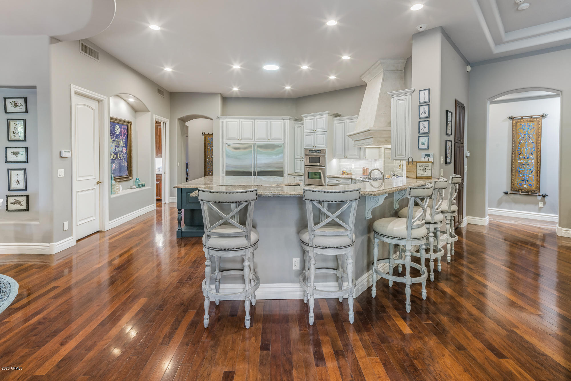307 West Lamar Road Phoenix, AZ 85013 - Photo 10 of 61 a view of a dining room with furniture and wooden floor