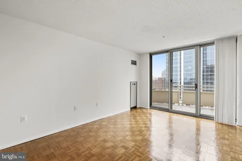 a view of an empty room and window