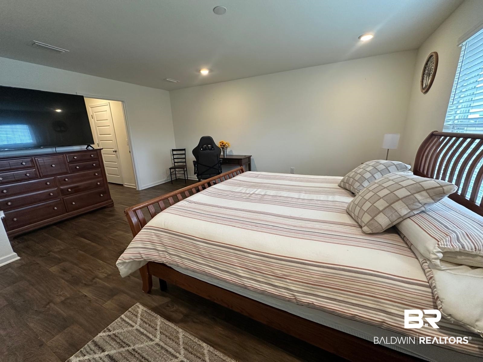 23792 Unbridled Loop Daphne, AL 36526 - Photo 15 of 36 Bedroom with dark wood-style flooring and recessed lighting