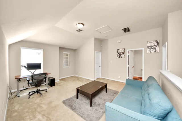 a living room with furniture