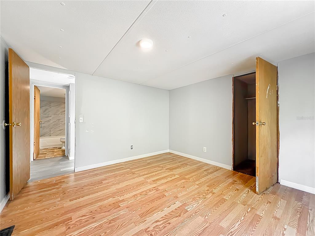 790 South Ebenezer Point Homosassa, FL 34448 - Photo 22 of 46 a view of empty room with wooden floor