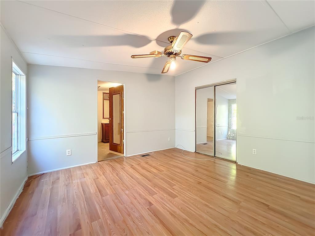 790 South Ebenezer Point Homosassa, FL 34448 - Photo 28 of 46 a view of empty room with wooden floor