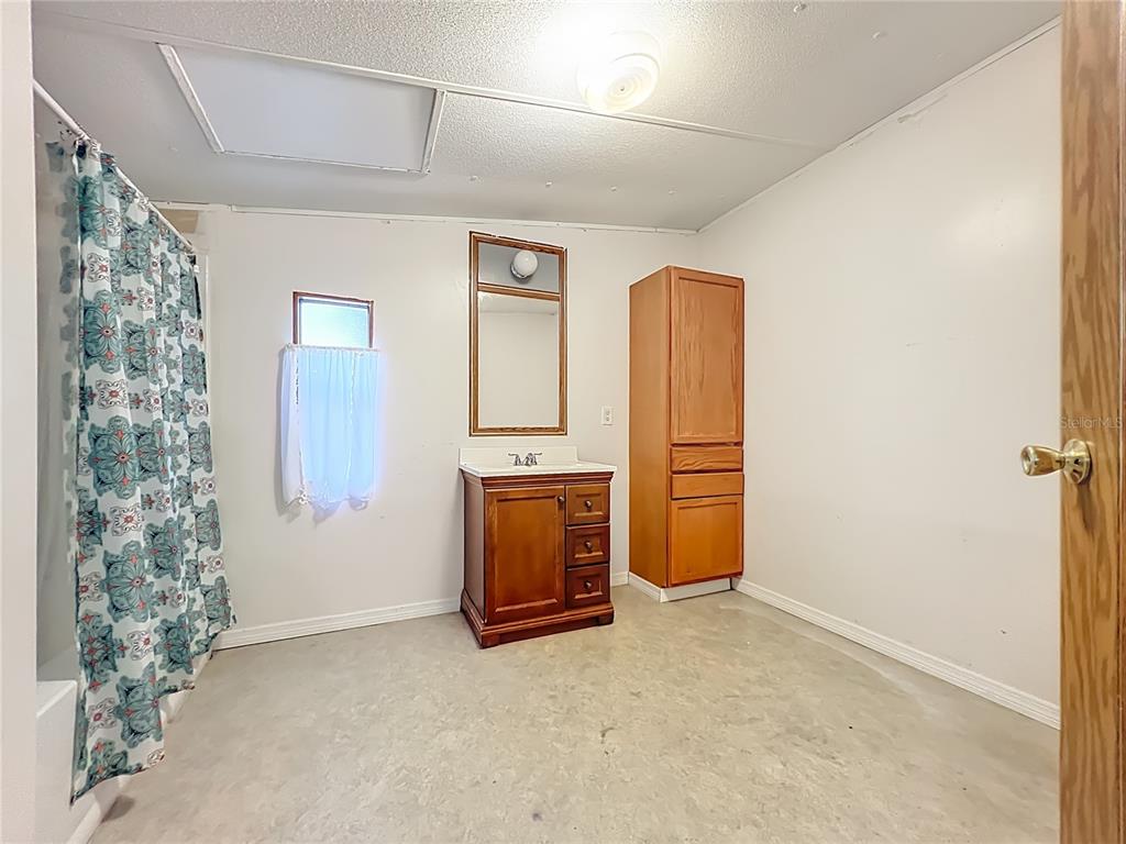 790 South Ebenezer Point Homosassa, FL 34448 - Photo 30 of 46 a view of an empty room with cabinet and fire place