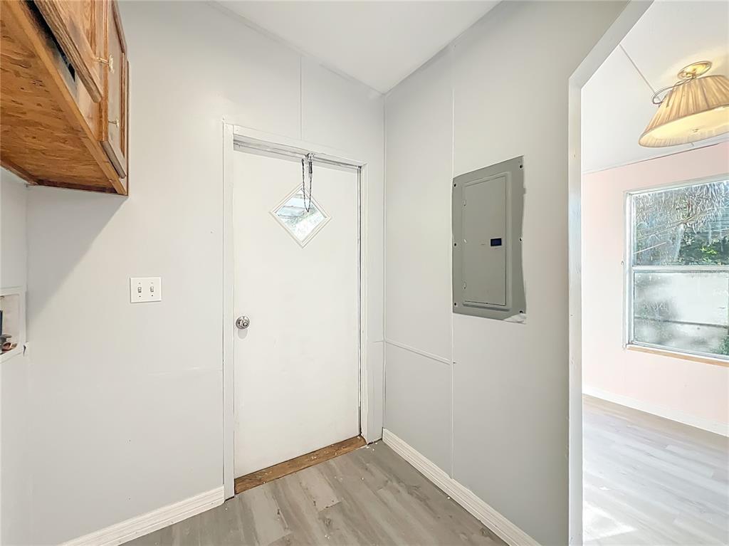 790 South Ebenezer Point Homosassa, FL 34448 - Photo 34 of 46 a view of bathroom with a sink window and wooden floor
