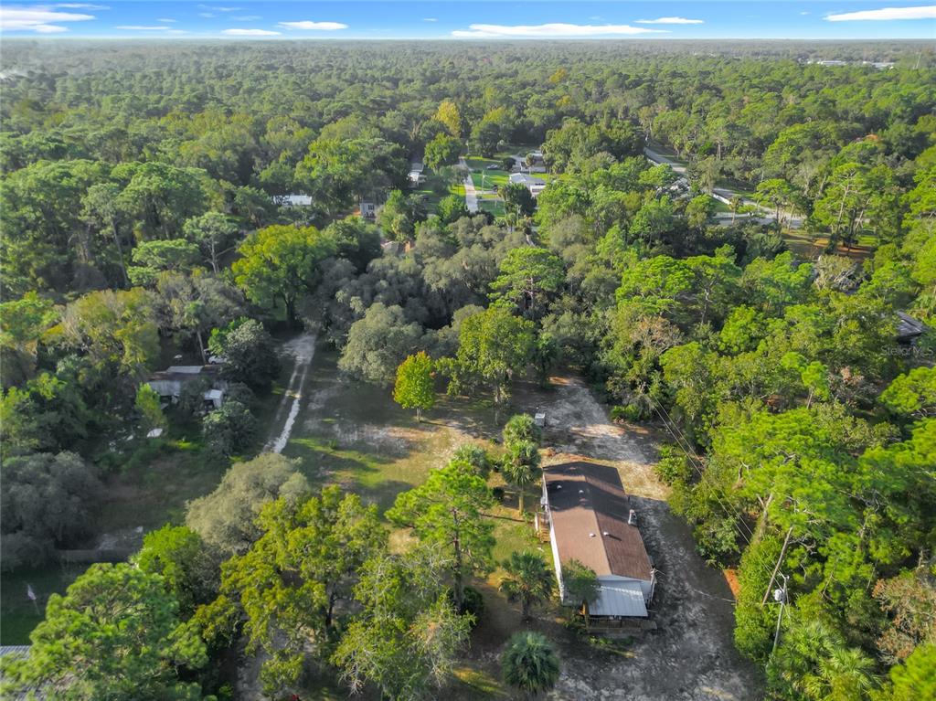 790 South Ebenezer Point Homosassa, FL 34448 - Photo 44 of 46 an aerial view of a house with a yard