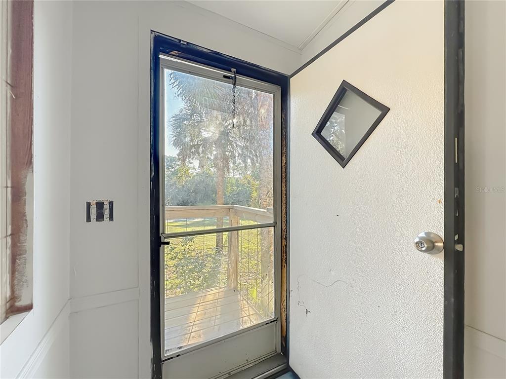790 South Ebenezer Point Homosassa, FL 34448 - Photo 6 of 46 a view of a small space with a window