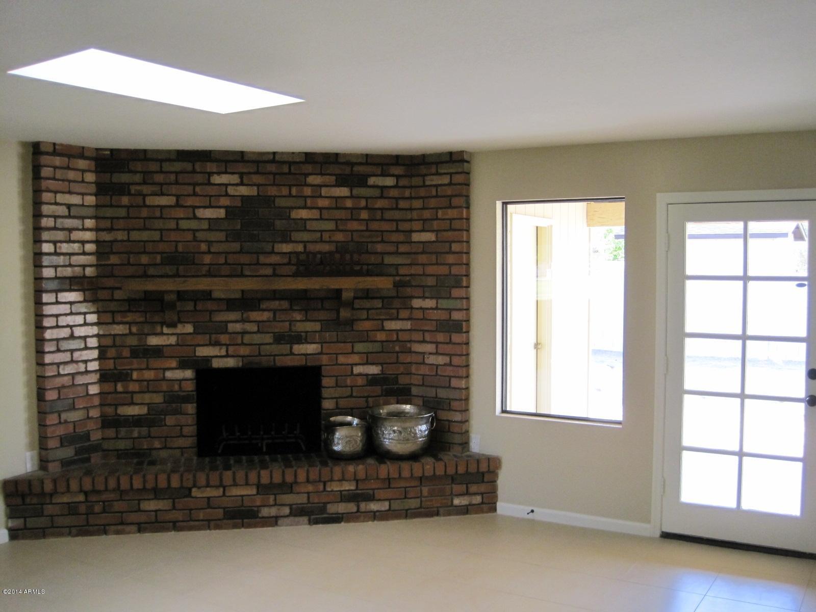 3014 East Decatur Street Mesa, AZ 85213 - Photo 11 of 30 fireplace