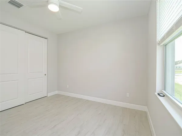 a bathroom with a sink shower and a toilet