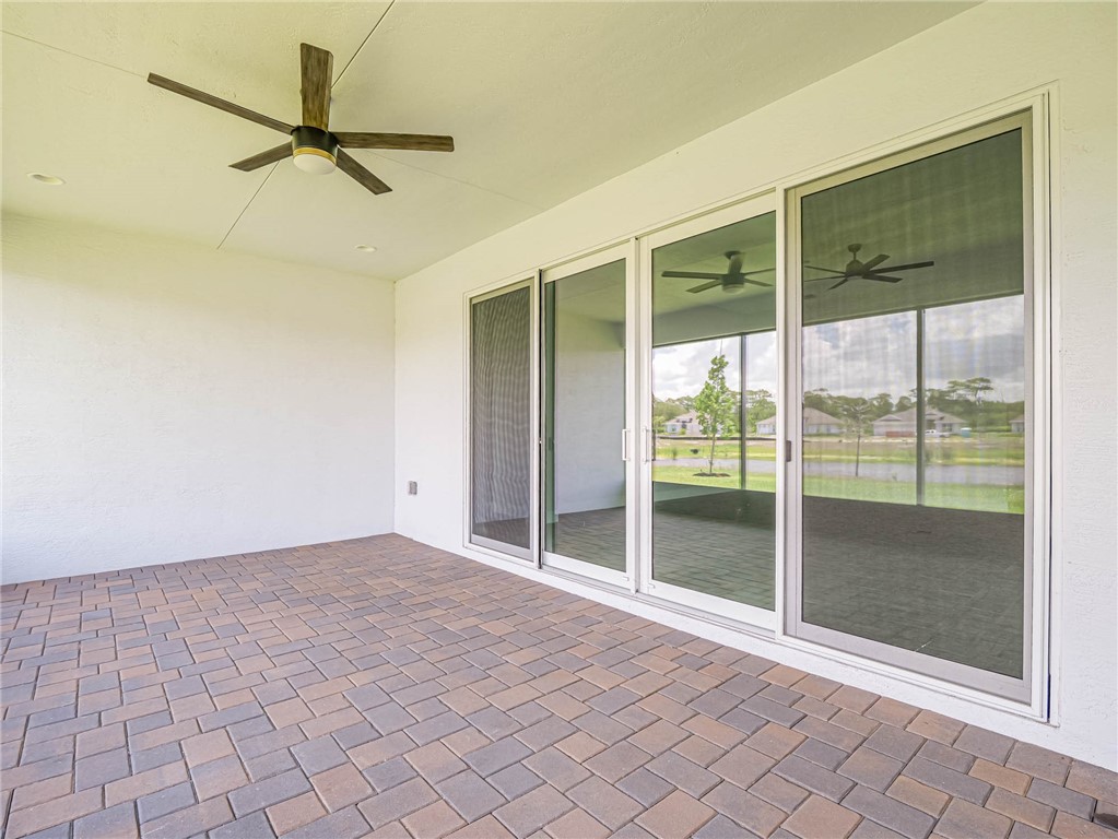 6422 High Pointe W Way Vero Beach, FL 32967 - Photo 27 of 33 a view of a room with a ceiling fan and window