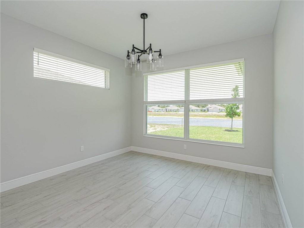 6422 High Pointe W Way Vero Beach, FL 32967 - Photo 9 of 33 a view of an empty room with a window