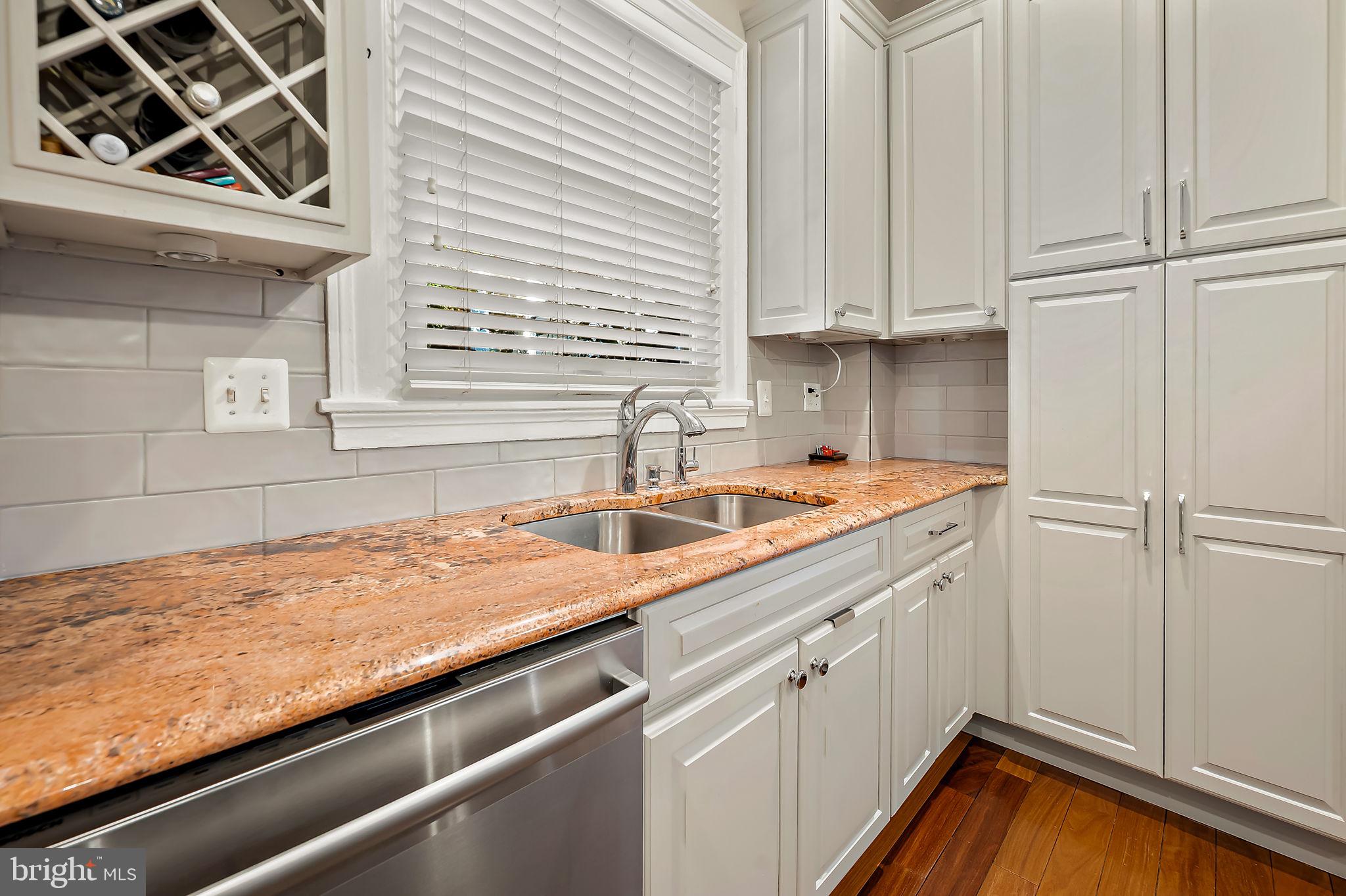 3923 Canterbury Road Baltimore, MD 21218 - Photo 16 of 42 a view of a kitchen with a sink and cabinets
