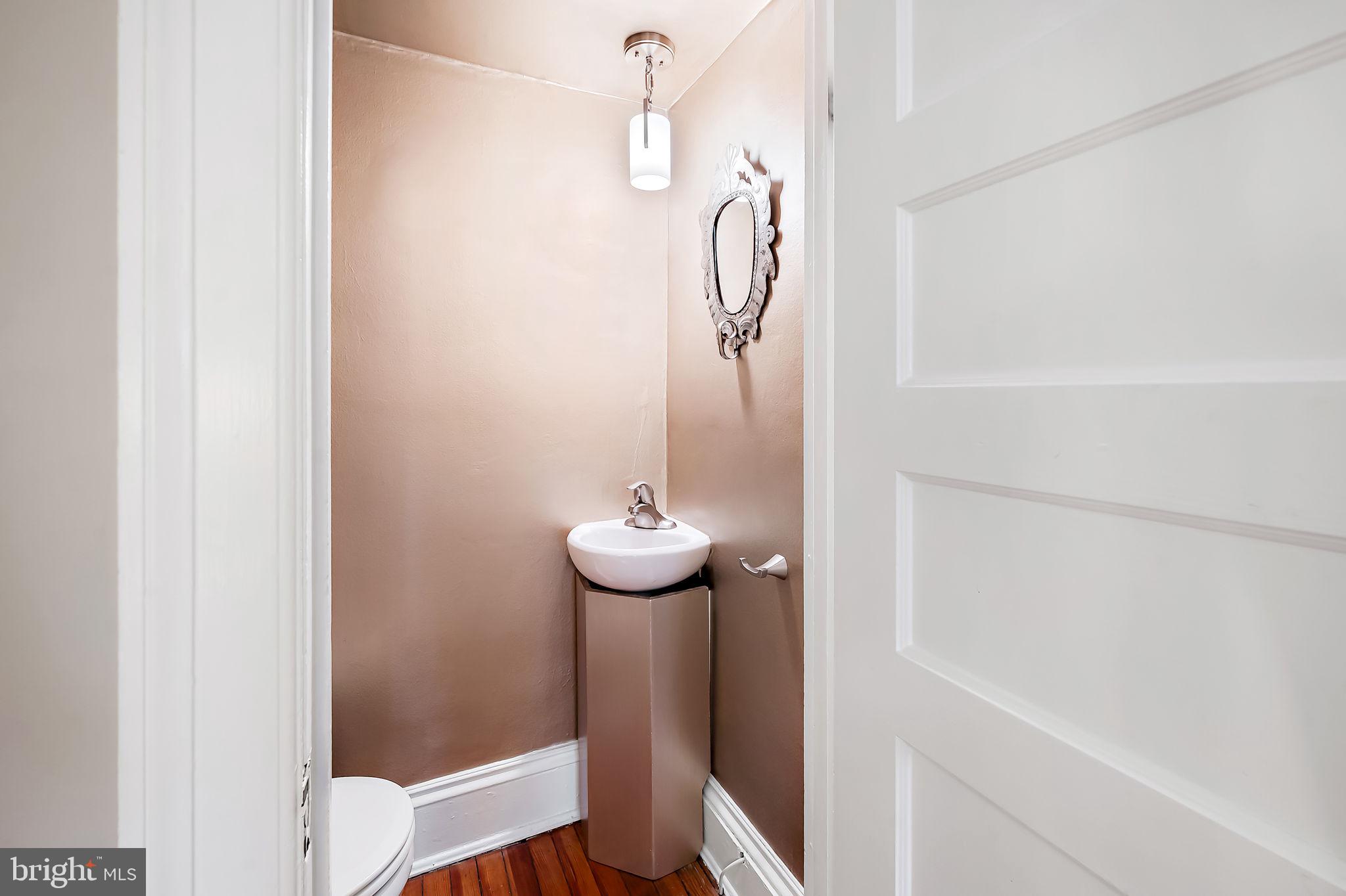 3923 Canterbury Road Baltimore, MD 21218 - Photo 19 of 42 a bathroom with a shower