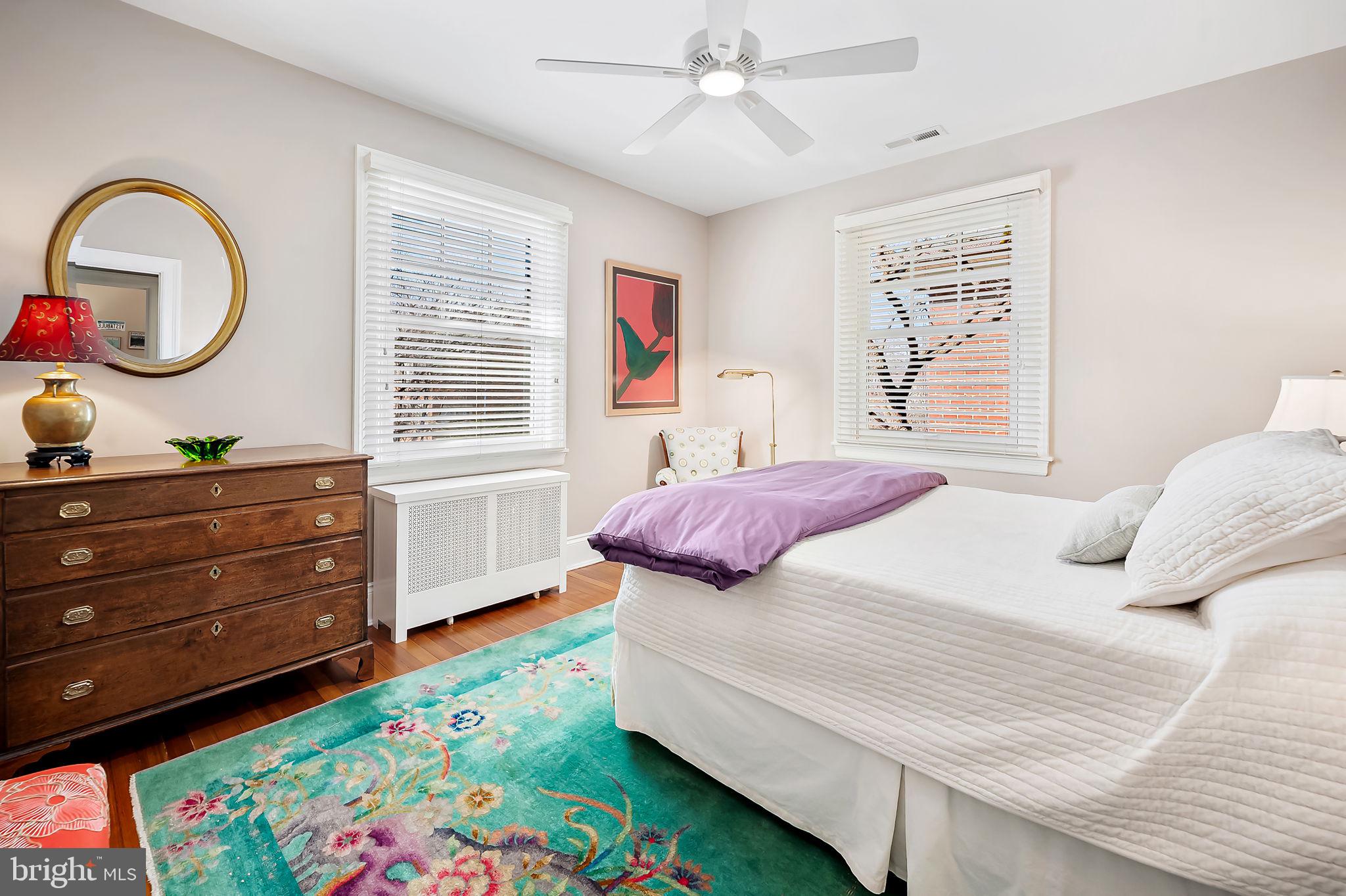 3923 Canterbury Road Baltimore, MD 21218 - Photo 29 of 42 a bedroom with a bed and a dresser