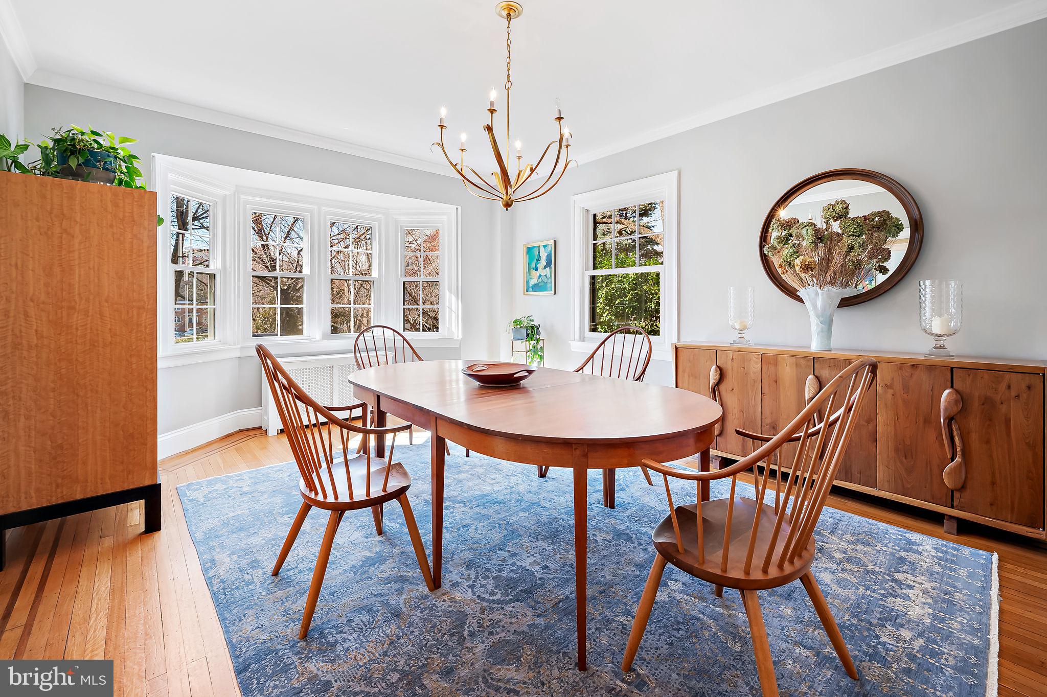 3923 Canterbury Road Baltimore, MD 21218 - Photo 10 of 42 a view of a dining room with furniture and a large window