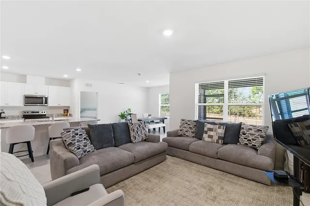 a view of a dining room with furniture