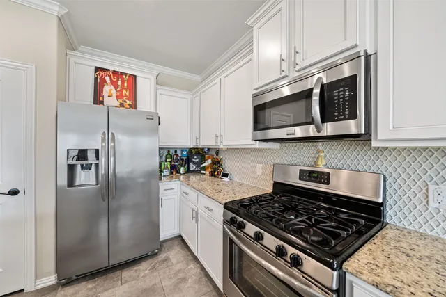 a bathroom with a tub and a shower