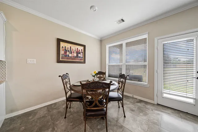 a bathroom with a granite countertop sink mirror and shower
