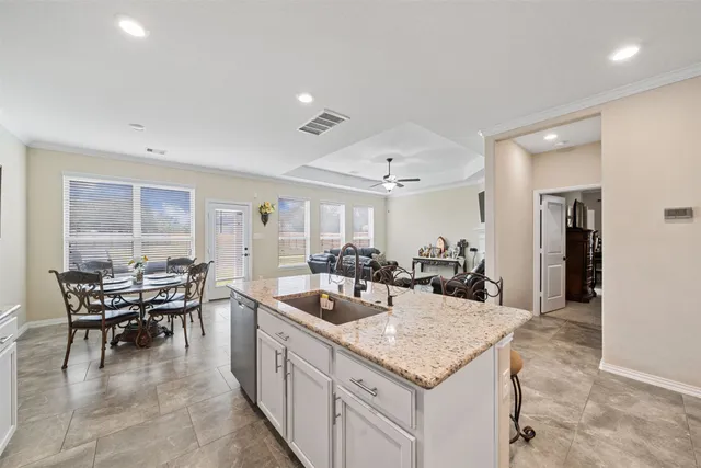 a living room with furniture a fireplace