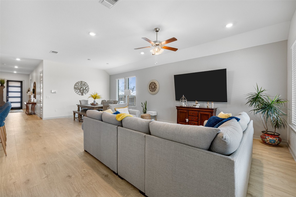 109 Rambling Rapids Drive Georgetown, TX 78628 - Photo 18 of 37 Living area featuring light wood-type flooring, recessed lighting, and a ceiling fan