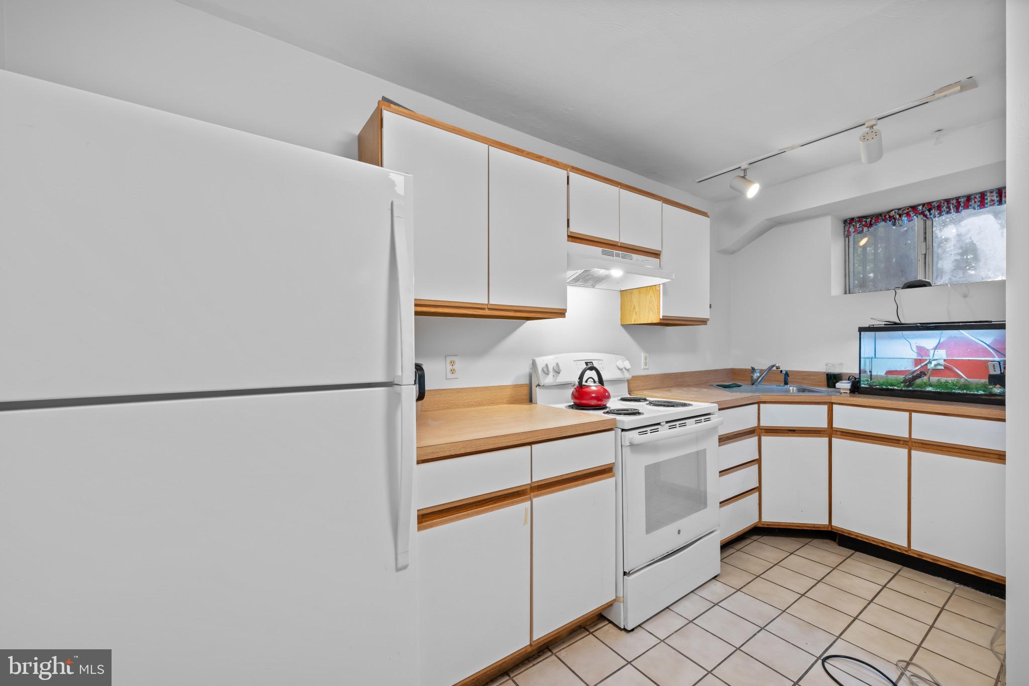 12101 Duckettown Road Laurel, MD 20708 - Photo 35 of 51 Basement Kitchen.