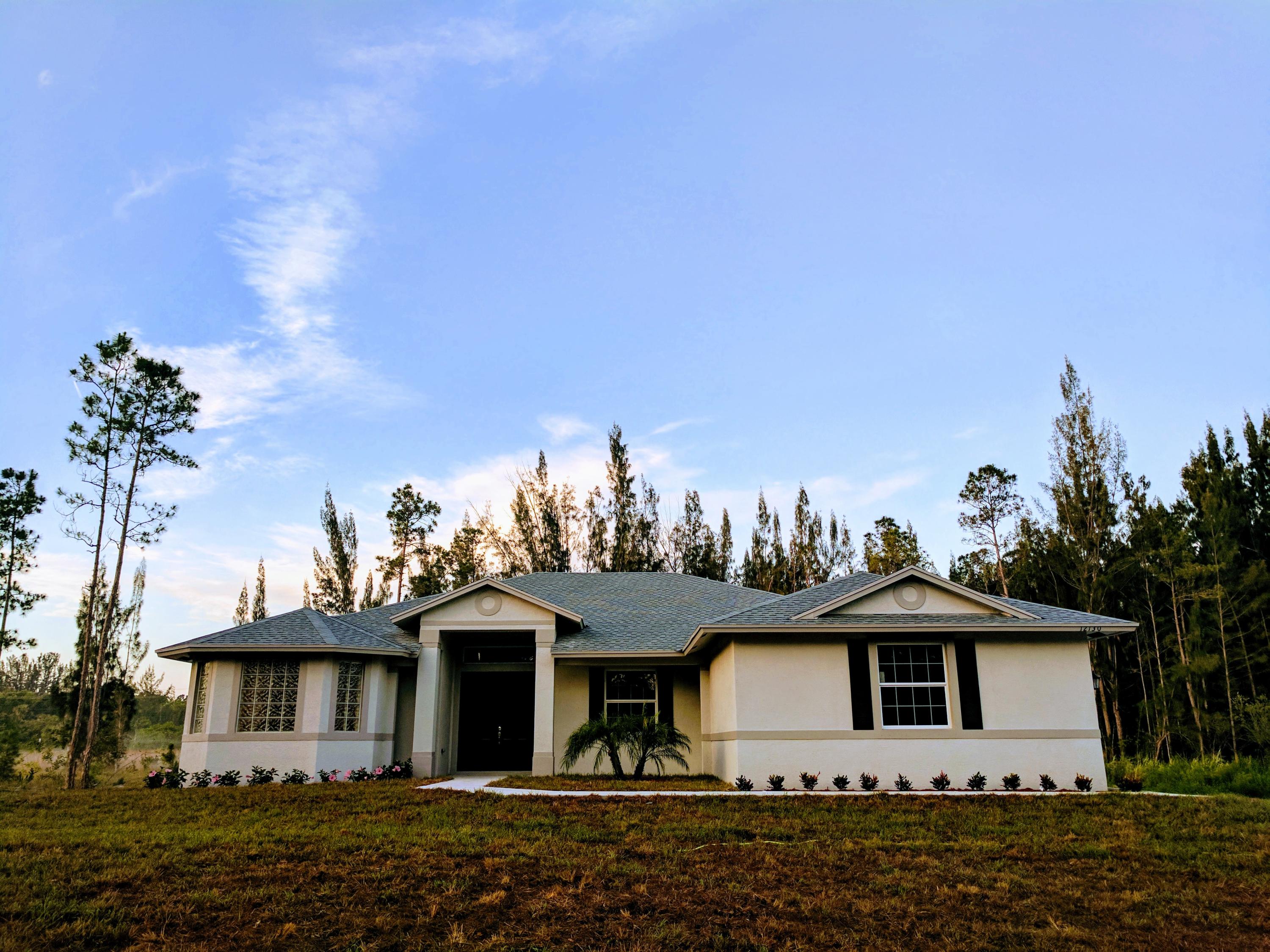 12130 181st Place North Jupiter, FL 33478 - Photo 1 of 21 IMG_20170522_063828